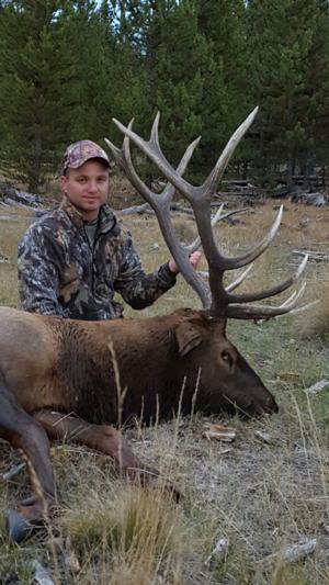 A solid 6x6 for this happy archery elk hunter!