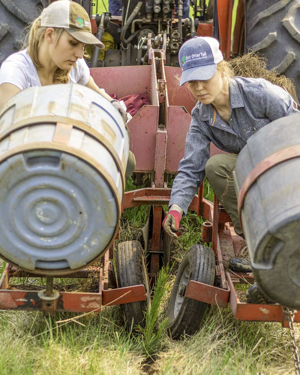 Photo of staff on the tree planter.