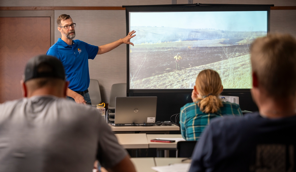 In state with deadly fire history, prescribed burn coordinator focuses on associations for safe, effective prairie projects